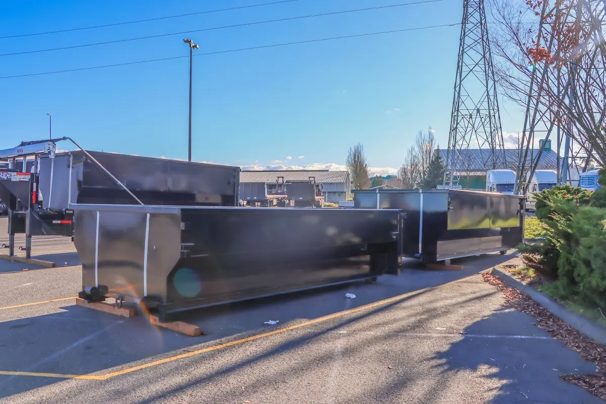 Roll-off dumpster ready for waste disposal at job site for Yard Waste Dumpster Rental in Raymore
